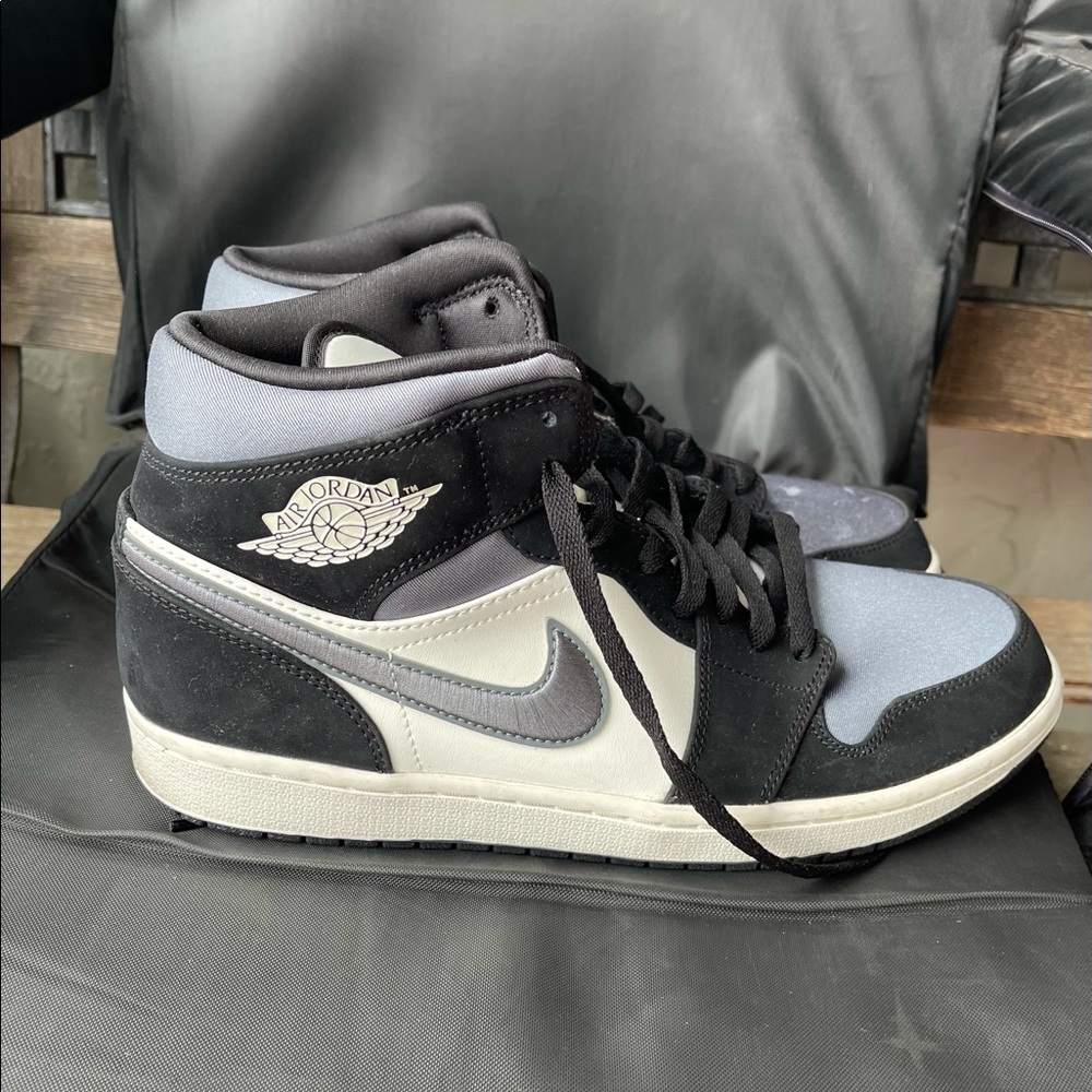 Black gray and white Jordan’s